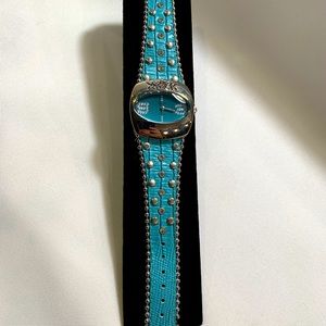 Blue bedazzled, leather strap watch